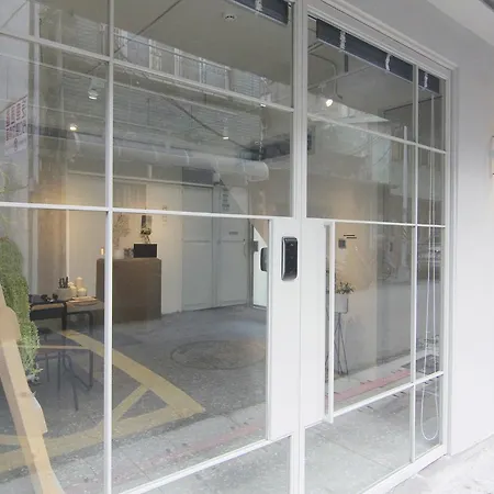 门草行旅酒店